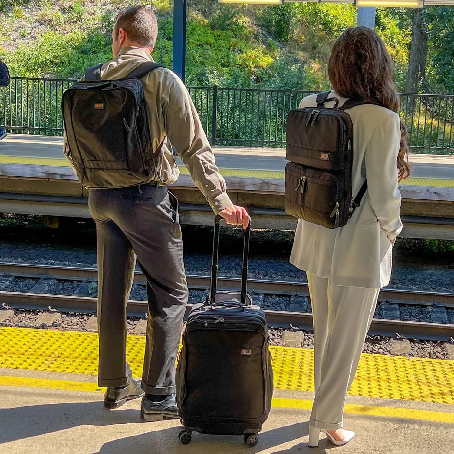 Trilogy Expandable Spinner (Zinfandel): Fits under-seat on most airplanes. Two convenient side pockets! Expandable, with solid base for strength and stability. 4-wheel design glides through airports!